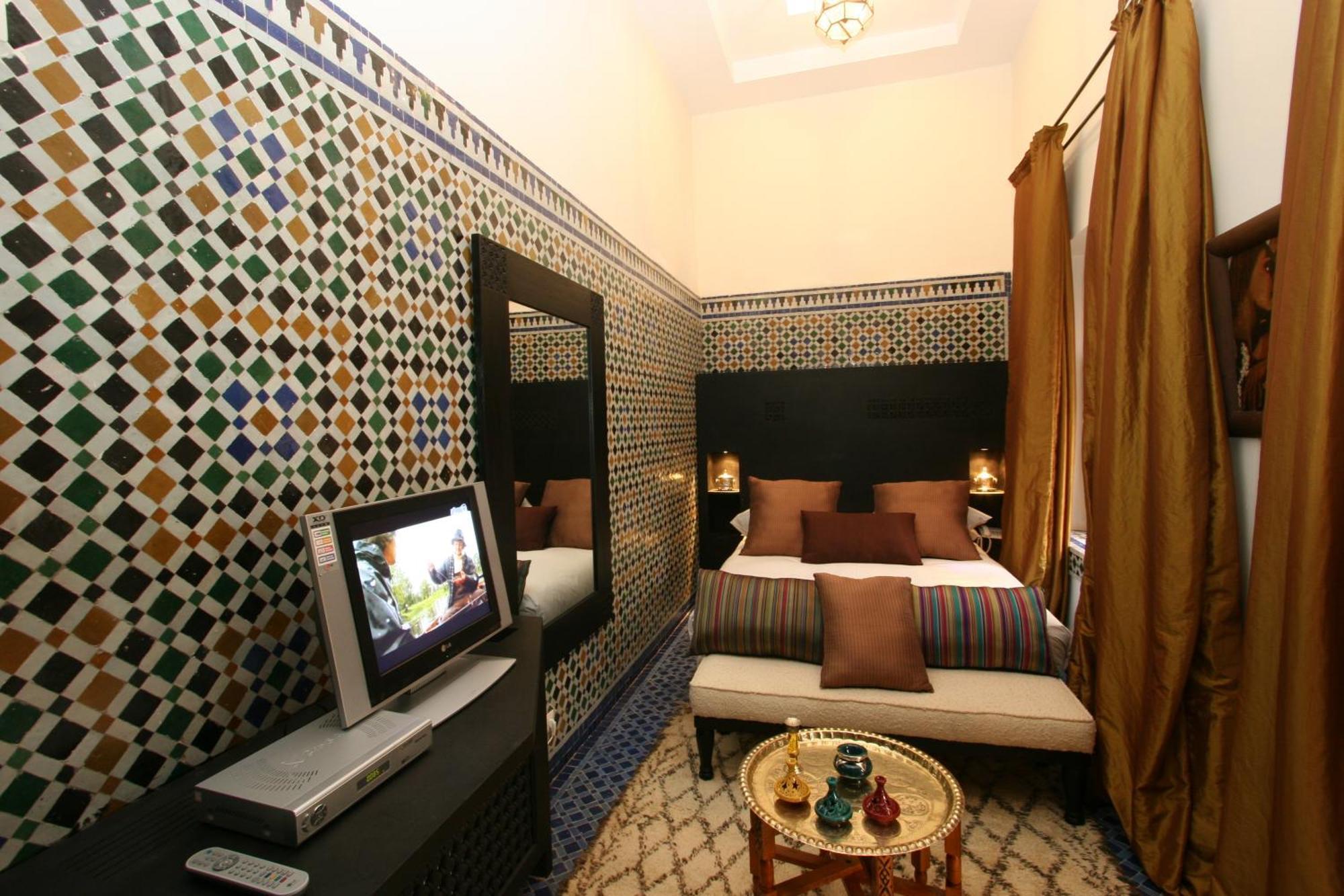 Riad Palais Calipau Marrakesch Zimmer foto A room at the hotel