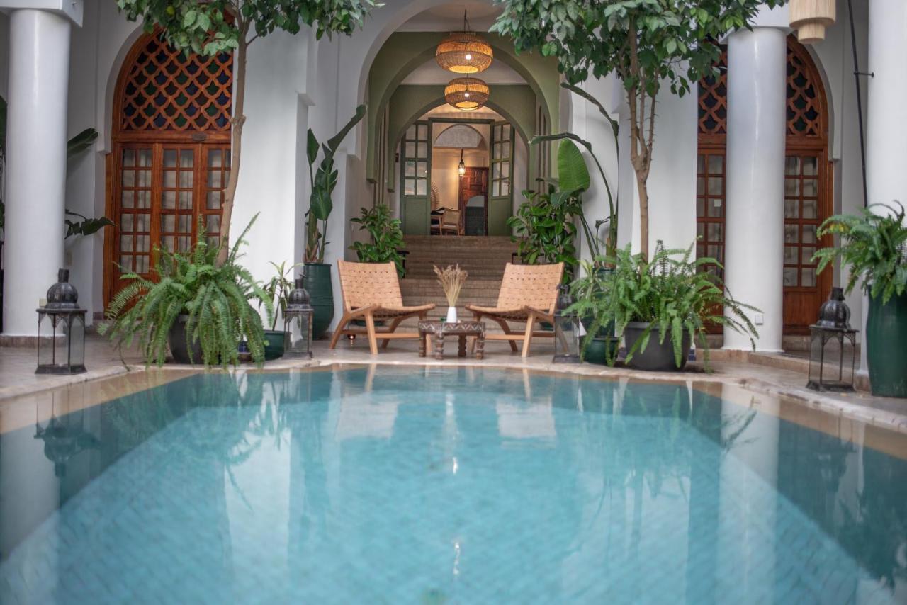 Riad Palais Calipau Marrakesch Exterior foto The swimming pool at the hotel
